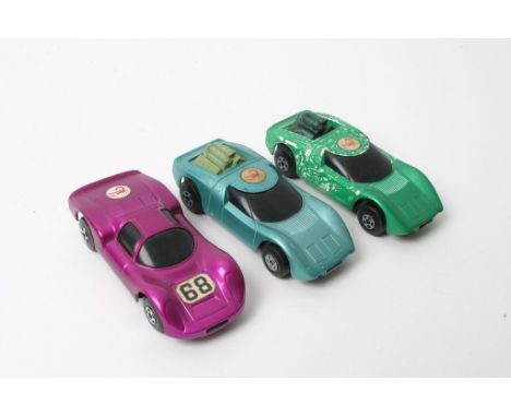 Three Matchbox Superfast Pre-Production prototype cars for No. 1 Scorpion in turquoise with green exposed engine, one in gree