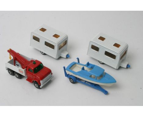 Matchbox Superfast No 71 Wreck Truck having red cab, green light, yellow hook and uncast inside truck, and two No 31 Caravan 