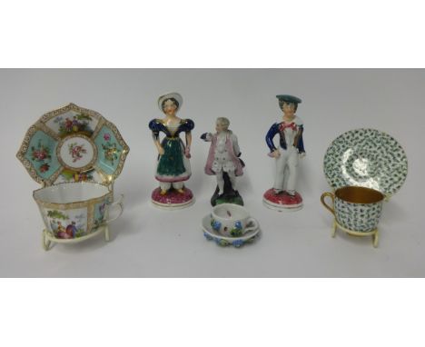 A pair of 19th Century pottery figures, height 16cm, a 19th Century continental cabinet cup and saucer, a Royal Worcester min