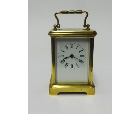 French brass cased carriage clock, fitted keywind, height 17cm handle up, running