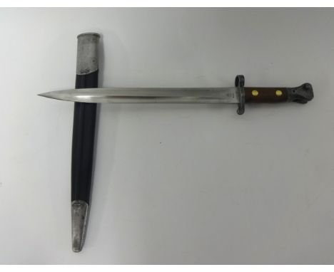 A British 1907 pattern bayonet by R. Mole, 12-inch double-edged and double fullered blade with war department markings, woode