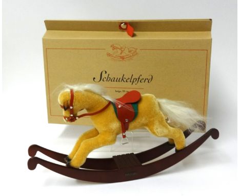 Steiff rocking horse 037849, light cinnamon mohair horse with white mohair mane and tail. Red vinyl saddle and bridle, green 