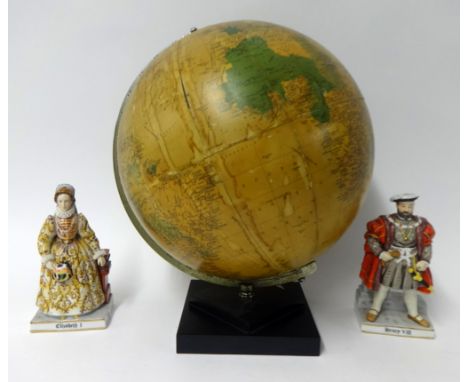 A 20th Century globe together with a pair of modern porcelain figures Henry VIII and Elizabeth I (3).