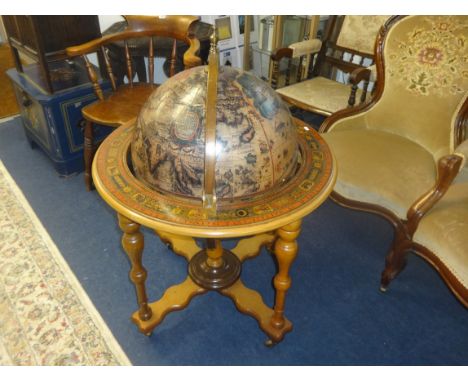 DRINKS CABINET, Terrestrial globe form with hinged top, with various decanters, drinkng glasses and tots