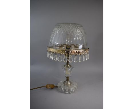 A Glass Table Lamp and Shade. The Silver Plated Rim Adorned with Glass Droppers, 38cm High&nbsp;