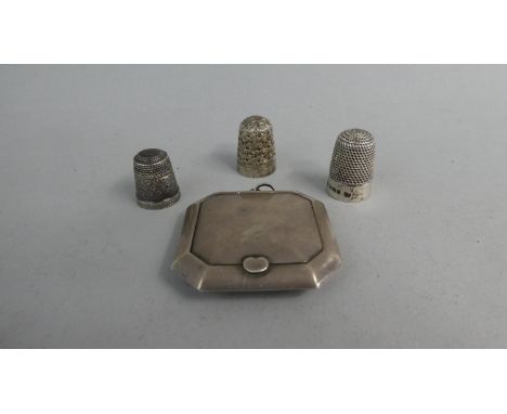 A Small Silver Ladies Powder Compact with Hinged Lid Having Inner Mirror (AF) Together with Three Silver Thimbles&nbsp;