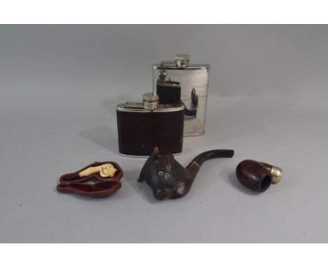 A Cased Novelty Meerschaum Claw Pipe, A Carved Bull's Head Pipe, A Pipe Bowl and Two Hip Flasks