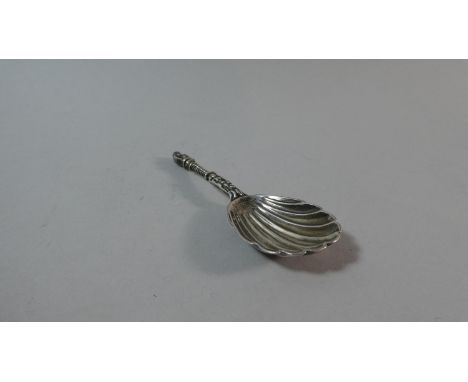 A Victorian Silver Tea Caddy Spoon with Twisted Handle, Apostle Finial and Shell Shaped Bowl 