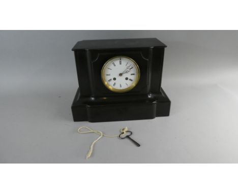 A Black Slate Mantle Clock of Architectural Form, 32cm Wide