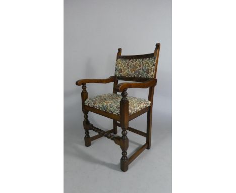 An Oak Framed Tapestry Upholstered Arm Chair