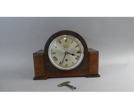 An Oak Cased Art Deco Westminster Chime Clock by Benson (incorrect pendulum)