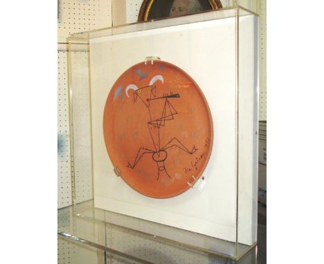 JEAN COCTEAU (French, 1889-1963), 'Faune-Triangle a La Flute', ceramic plate in red terracotta painted decoration in polychro