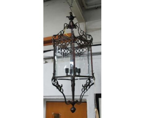 HANGING LANTERN, in bronzed frame, four branches with concave glass inserts, 114cm H.