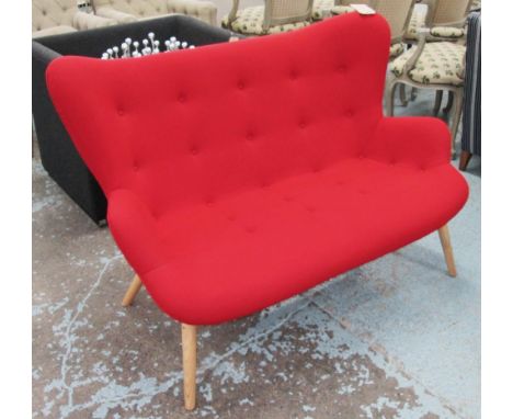 SOFA, two seater, in red buttoned fabric on turned supports, 135cm L.