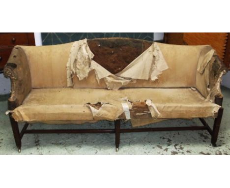 SOFA, George III mahogany with camel back and square section legs joined by stretchers on brass castors, 202cm W. (upholstery