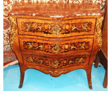 BOMBE COMMODE, late 19th century French rosewood, marquetry and gilt bronze mounted with a rouge marble top over three drawer