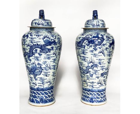 DRAGON TEMPLE VASES, a pair, Chinese blue and white ceramic floor standing with lids, 105cm H. (2) 