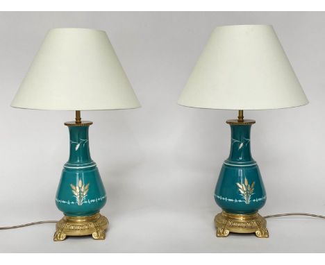 TABLE LAMPS, a pair, Chinese jade green ceramic and gilt of graduated form with gilt metal base, 60cm H. (2) 