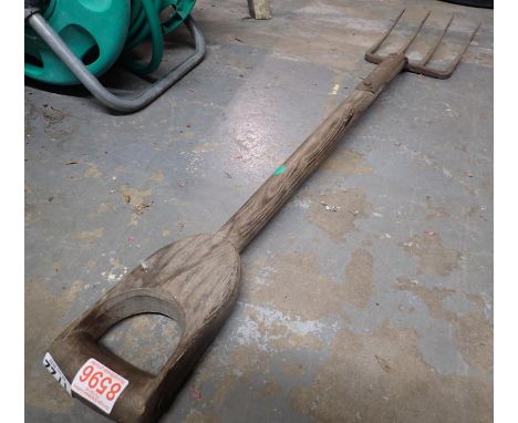 A wooden handled garden fork. Not available for in-house P&amp;P, contact Paul O'Hea at Mailboxes on 01925 659133 