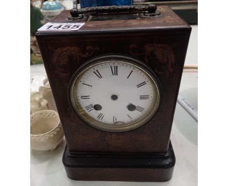 A carriage clock case and face, (no movement) with a pair of brass candlesticks. Not available for in-house P&amp;P, contact 