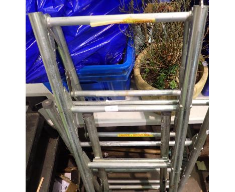 Heavy steel fold out metal ladder. Not available for in-house P&amp;P, contact Paul O'Hea at Mailboxes on 01925 659133 