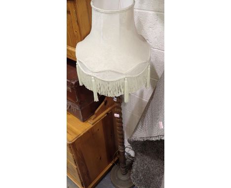 An oak standard lamp with shade. Not available for in-house P&amp;P, contact Paul O'Hea at Mailboxes on 01925 659133 