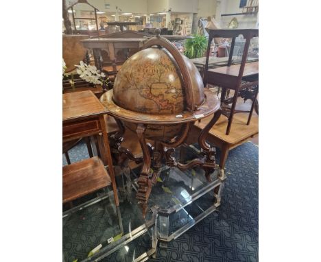 LARGE GLOBE DRINKS CABINETThe globe is in good condition however the condition of the rim is fair. The globe is 120 inches in