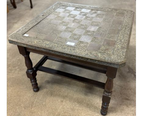 A faux bronze topped games table 