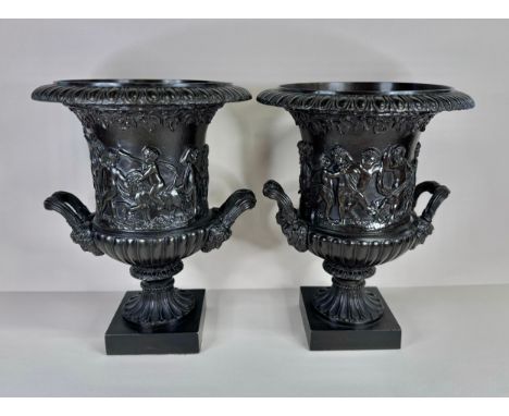 A pair of 19th Century Italian Grand Tour bronze Medici vases, 27cms h 