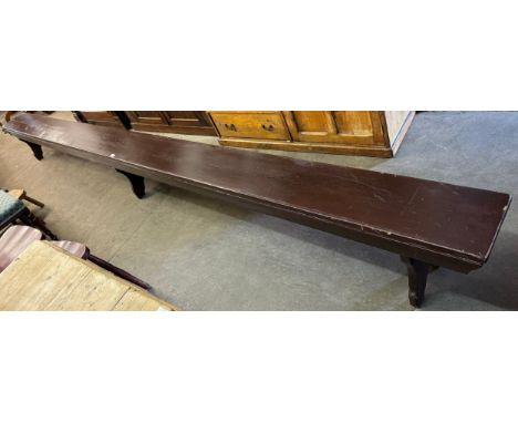 A large pine school gymnasium bench 