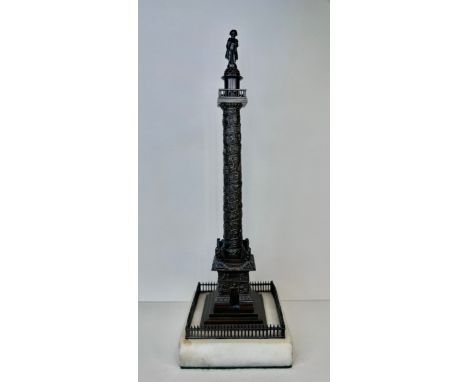 A 19th Century French bronze Vendome Column, on marble socle, 28cms h 