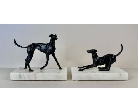 A pair of early 20th Century French bronze greyhounds, on marble socles, tallest; 13cms h 