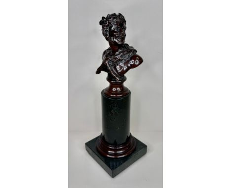A 19th Century French bronze bust of a laughing Satyr, on marble socle, 24cms 