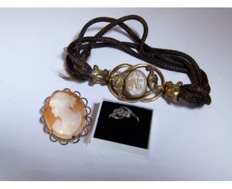 COLLECTABLE ITEMS. Collectable items including pinchbeck Victorian hair tie with authentic human hair, pinchbeck cameo brooch
