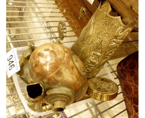 TRENCH ART. Trench art, two cartridge cases, horse door knocker and a vehicle side light 