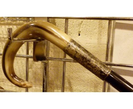 WALKING STICK. Horn handled silver collared walking stick