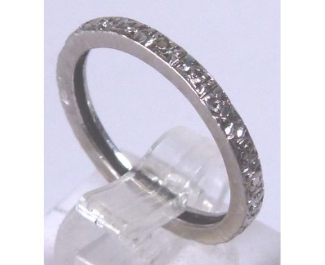 18 CT ETERNITY RING. 18 ct white gold diamond set eternity ring, 2g