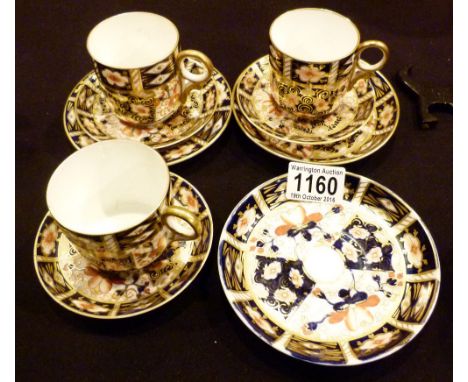 ROYAL CROWN DERBY. Nine Crown Derby items, cups saucers & plates