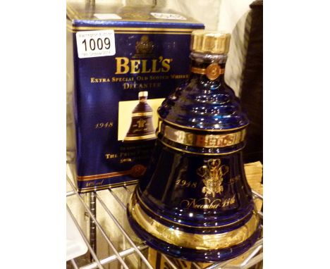 BELLS WHISKY DECANTER. Sealed Bells whisky decanter celebrating the 50th Birthday of the Prince of Wales