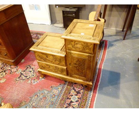 TELEPHONE TABLE. Carved Chinese style telephone table with with drawers and cupboard 