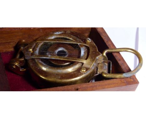 CASED COMPASS. Wooden cased compass