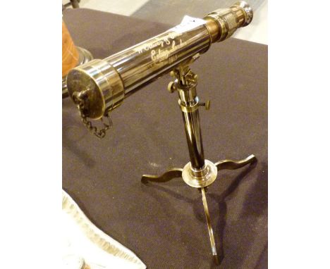 TELESCOPE. Brass telescope on tripod base, L: 23 cm 