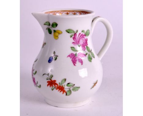 AN 18TH CENTURY WORCESTER SPARROWBEAK JUG painted with flowers and winged insects. 3.5ins high.