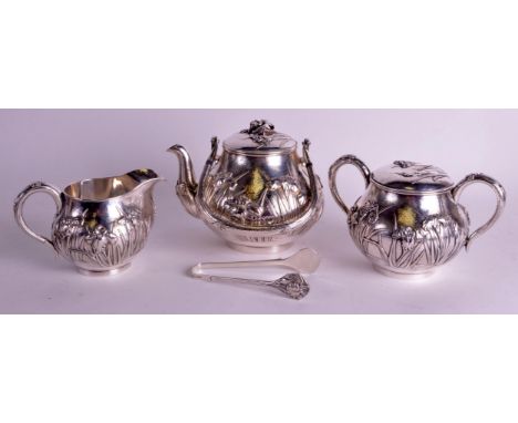 A FINE EARLY 20TH CENTURY JAPANESE MEIJI PERIOD FOUR PIECE SILVER TEASET by S Taekeuchi &amp; co, comprising of teapot, sugar