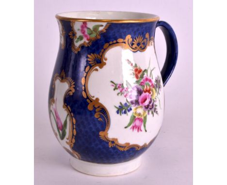 A FINE 18TH CENTURY WORCESTER BELL SHAPED MUG painted on a blue scale ground with floral cartouches. Provenance: Callowhill C