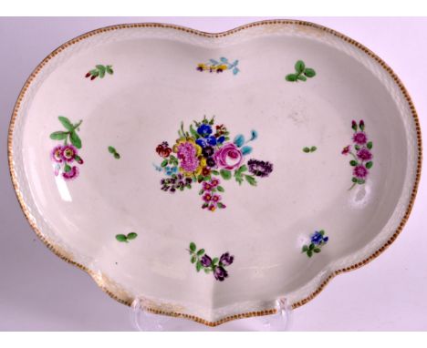 AN 18TH CENTURY WORCESTER KIDNEY SHAPED DISH painted with central floral sprays under a gilt border. 10ins wide.