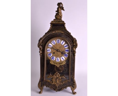 A MID 19TH CENTURY FRENCH BOULLE BRACKET CLOCK with blue enamel numerals and repousse decorated dial. 1ft 8.5ins high.
