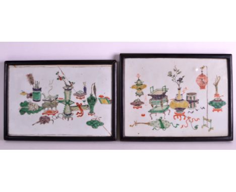 A PAIR OF 17TH CENTURY CHINESE FAMILLE VERTE RECTANGULAR PORCELAIN PANELS Kangxi, painted with precious objects and a caged b