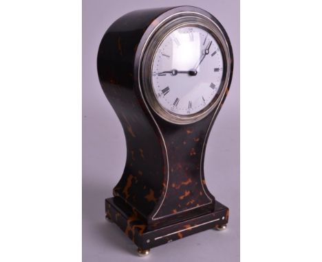 AN EDWARDIAN SILVER AND TORTOISESHELL BALLOON SHAPED MANTEL CLOCK C1907 with white enamel dial and silver inlay. 9.5ins high.