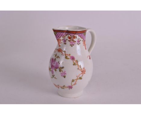 AN 18TH CENTURY WORCESTER SPARROWBEAK JUG painted with a dog rose in a circular floral panel, under a thick red border. 3.75i